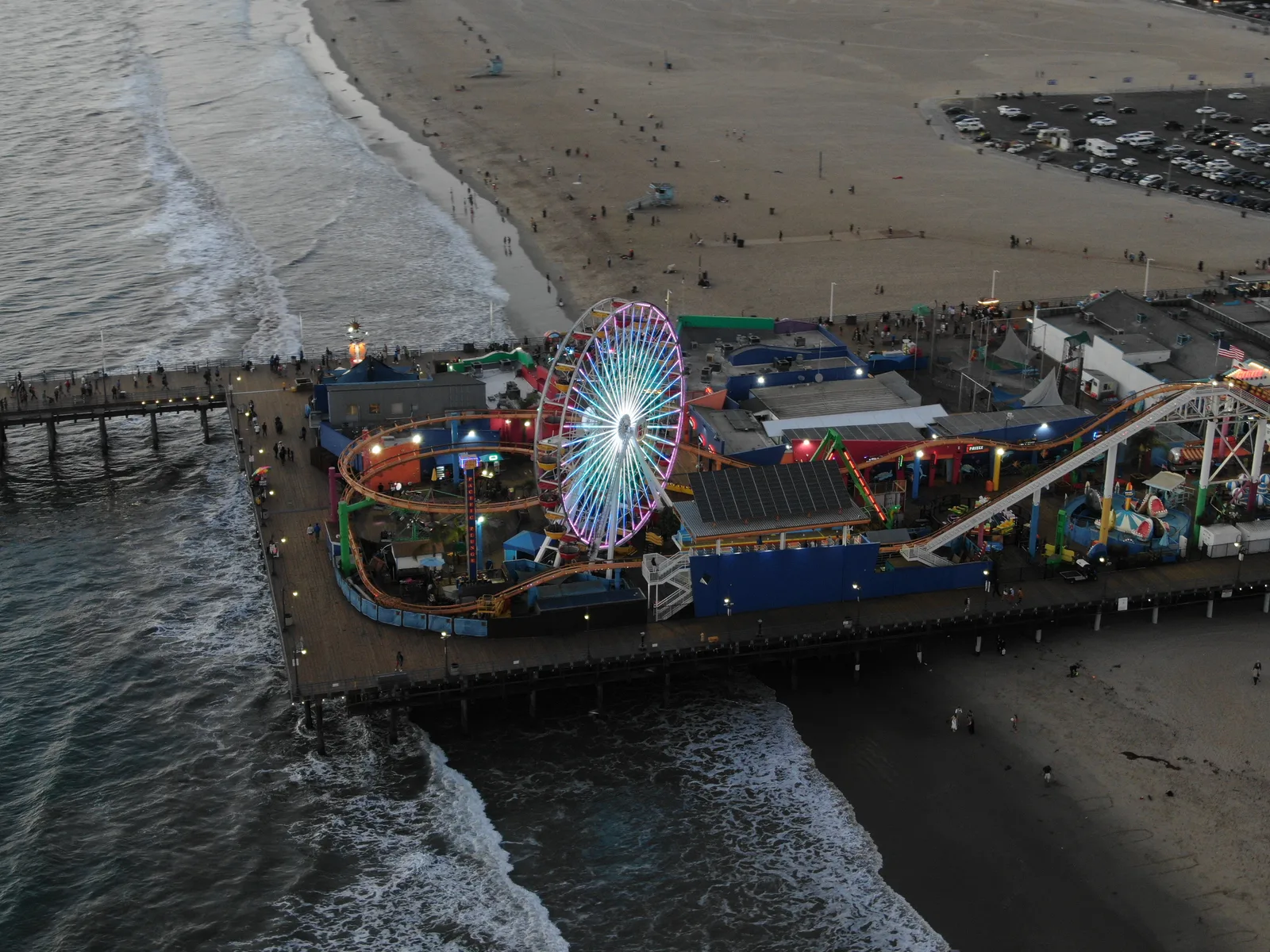 Santa Monica Pier amusement rides extending over the Pacific Ocean
