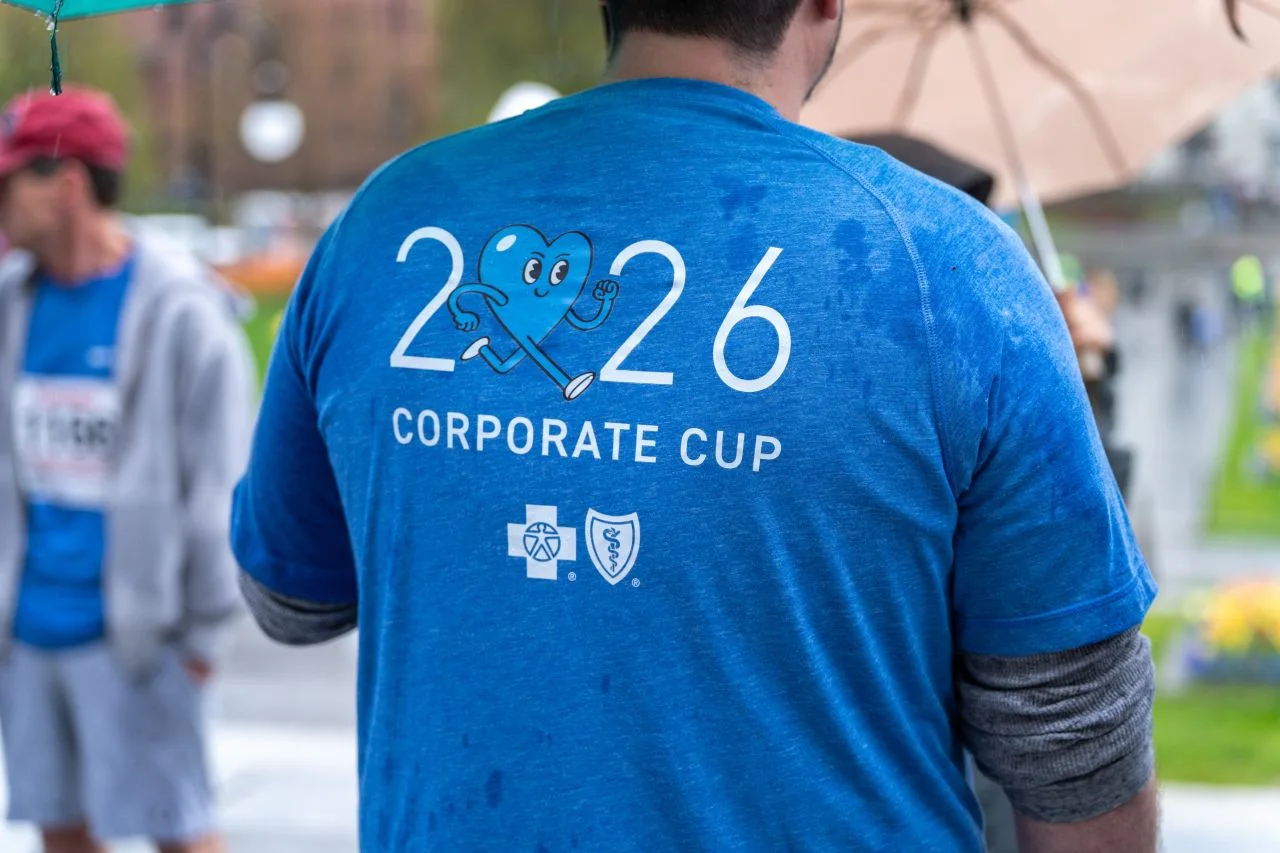 The back of a blue 2026 Corporate Cup participant shirt.